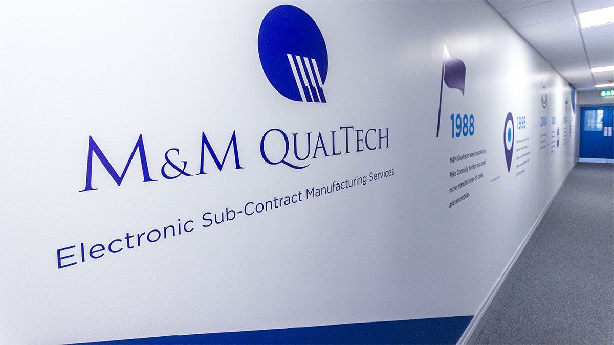 Interior corporate wall branding for M&M Qualtech